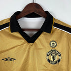 Camisa Dupla Face Retrô Manchester United 2001/02 100 Anos Masculina Branca e Preta ou Dourada